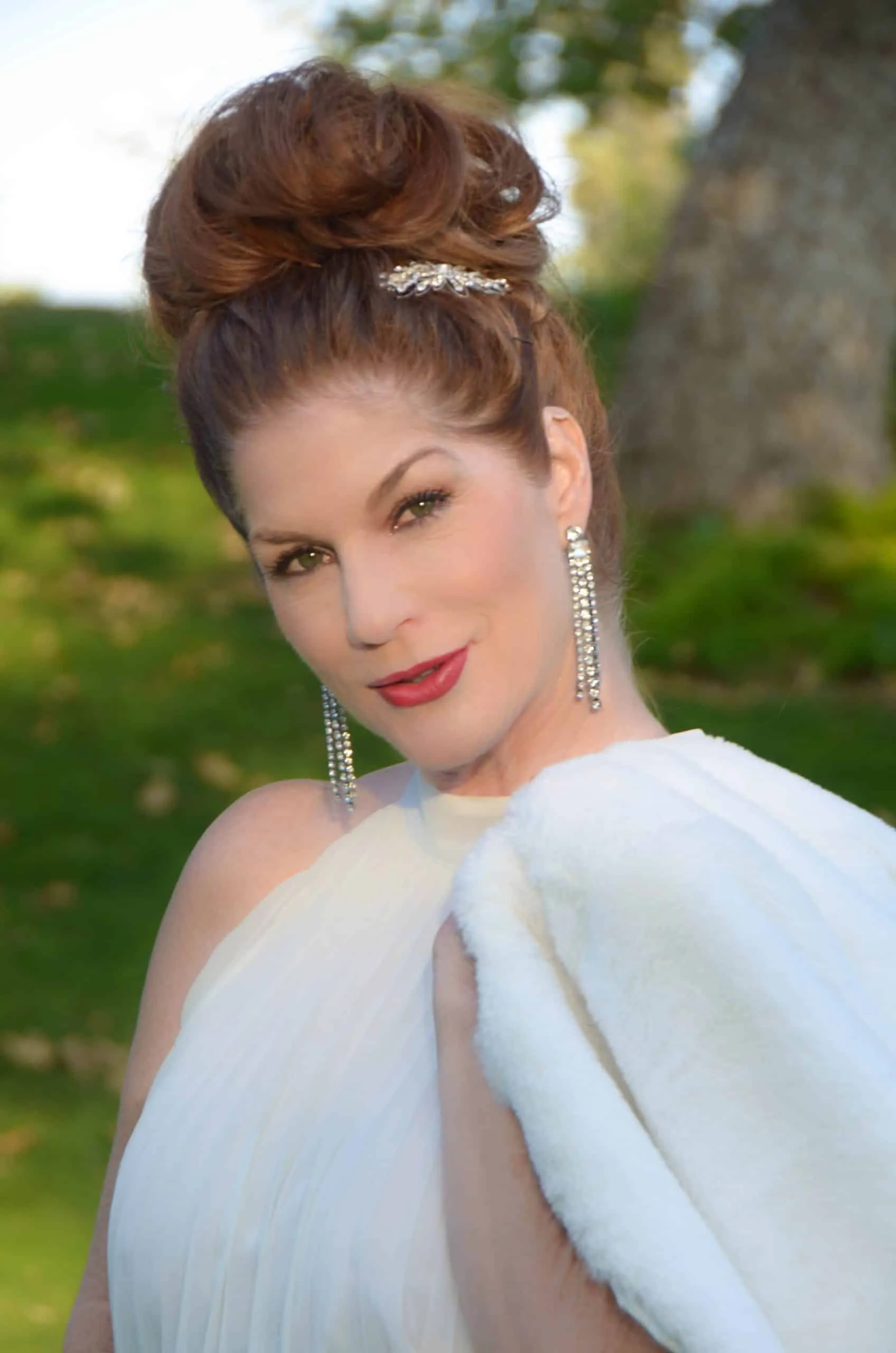 Dr. Tammy Bradshaw-Scott outdoors in a white dress