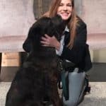 Compassionate veterinarian Dr. Tammy Bradshaw-Scott with therapy dog for animal healing and wellness.